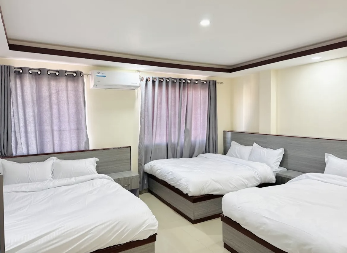 Triple room at Hotel White Dreams Kathmandu with three beds