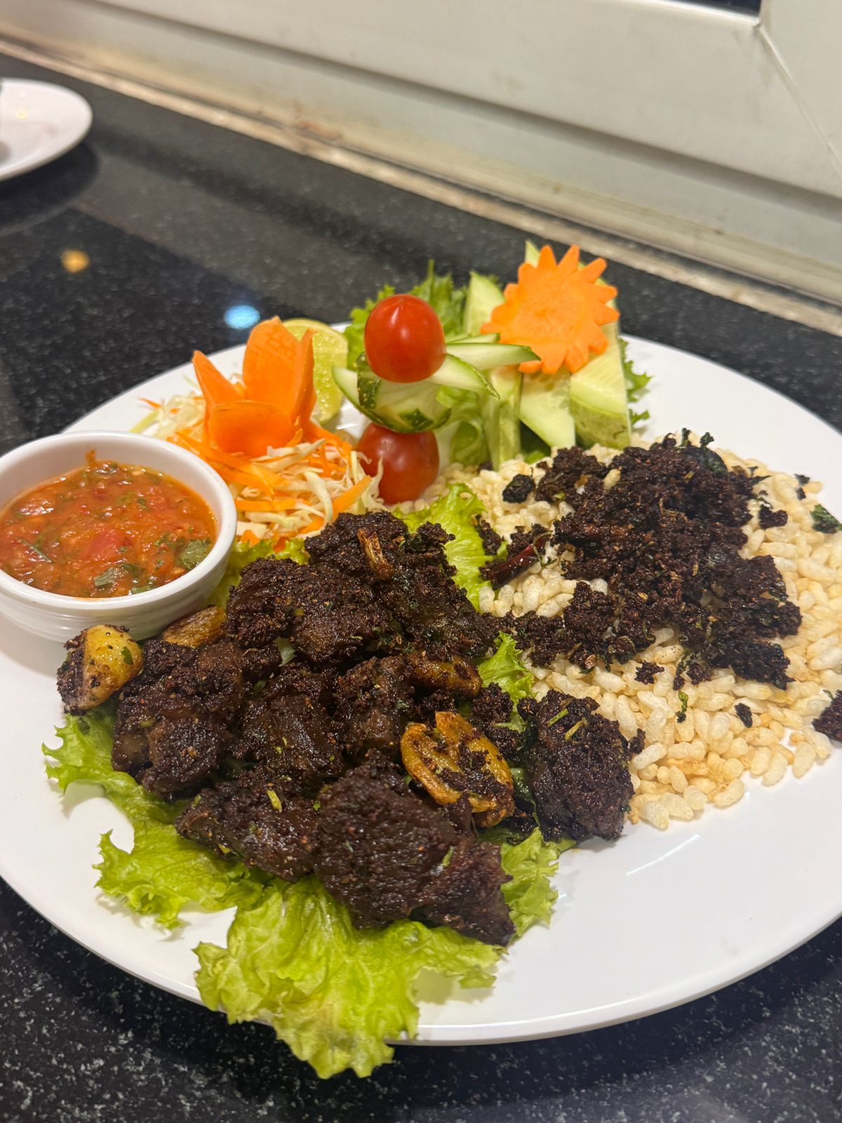 Traditional Nepali khaja set served at Hotel White Dreams restaurant